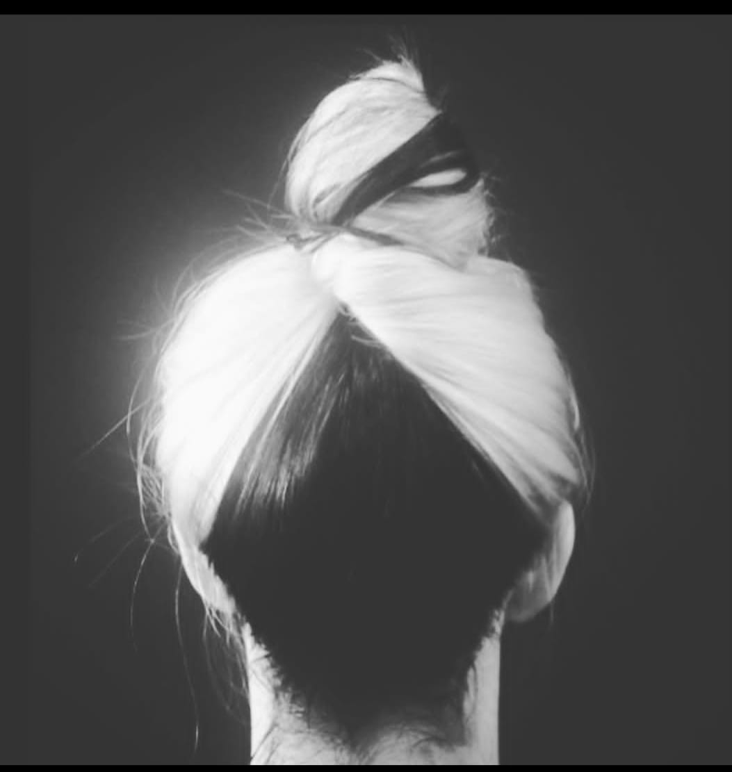 back of head with dyed white and black hair